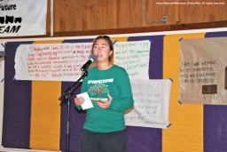 A participant from the 2016 Manzanar At Dusk program. shown here speaking during the open mic wrap-up session.