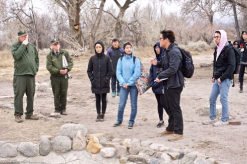 Manzanar National Historic SIte’s Chief of Cultural Resources Division Jeff Burton (left) told the students more about the many World War II-era gardens, and how oral histories and archeology were being used together to unearth more and more gardens.