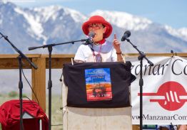 Karen Korematsu founder and Executive Director of the Fred T. Korematsu Institute, addresses the crowd during the 50th Annual Manzanar Pilgrimage, April 27, 2019, at the Manzanar National Historic Site.