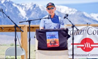 Attorney Dale Minami, Minami and Lew, L.L.P., addresses the crowd during the 50th Annual Manzanar Pilgrimage, April 27, 2019, at the Manzanar National Historic Site.